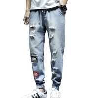 Patched Ripped Denim Joggers